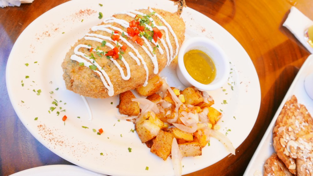 Poblano pepper stuffed with eggs, cheese, beans and other goodness.